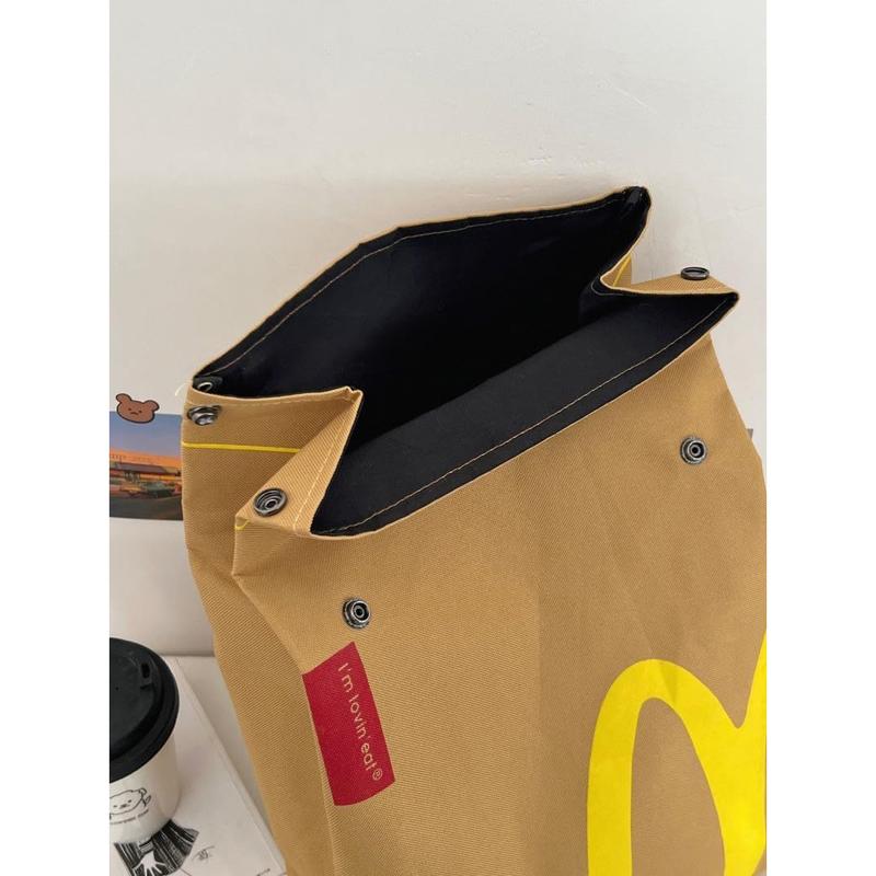 Interesting McDonald's large capacity canvas backpack, cute personalized shoulder messenger bag casual canvas backpack notebook bag, suitable for vacation, shopping, groceries